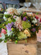 Flower farmer florist Georgie Newbery creates sheafs of flowers for coffins using simple sustainable floristry techniques & in this demonstration she will show you how you too can make such flowers as tributes & for sympathy. Suitable for professional florists & people who love to design with flowers for pleasure.